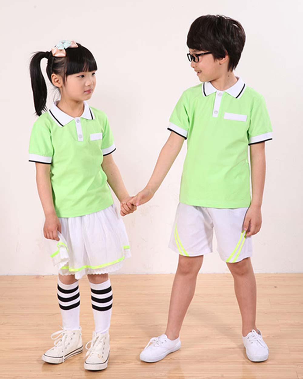 Đồng phục học sinh mầm non màu xanh lá phối trắng