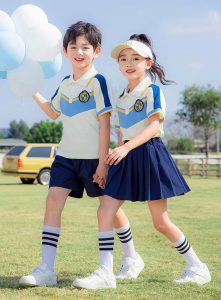 Đồng phục học sinh tiểu học màu xanh ngọc phối vàng